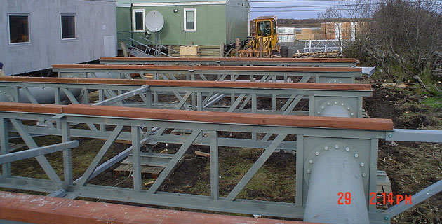 Arctic Surface Foundation© ready for installation of SIPS floor panels.<br><em>Photo courtesy of Dowland Construction Inc.</em>